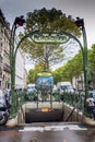 Historic vintage subway sign in the center of a European city. Vertical. Paris, France, 09/10/2019