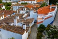 Historic walled town of Obidos, near Lisbon, Portugal. Beautiful streets of Obidos Medieval Town, Portugal. Street view of Royalty Free Stock Photo