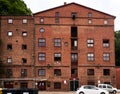 Historic weathered brick building with a warehouse and the production facilities for Danish pipe tobacco Royalty Free Stock Photo