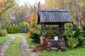 Historic well with a wooden roof farmhouse yard