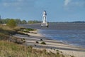 Historic white lighthouse on Elsflether Sand Germany