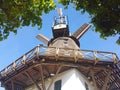 Historic windmill in front of blue sky Royalty Free Stock Photo
