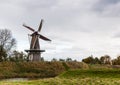 Historic windmill on the wall of an old village Royalty Free Stock Photo