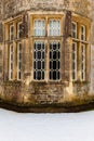 Historic window at Rousham House in snow