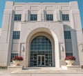 Historic Winter Garden City Hall in Florida. A preserved white three story building made of stone