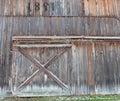 Historic 1891 FingerLakes solid wood agricultural barn sliding door in NewYorkState Royalty Free Stock Photo