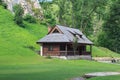 Historic wooden house in the village of Bran. Transylvania. Romania Royalty Free Stock Photo