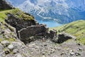 Historic World-War I Fortifications On Via Ferrata Delle Trincee Meaning Way Of The Trenches, With Lake Fedaia Down Below