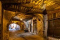 Historic Rue Obscure Dark Street underground passageway under harbor front houses in old town of Villefranche-sur-Mer in France