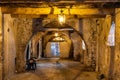 Historic Rue Obscure Dark Street underground passageway under harbor front houses in old town of Villefranche-sur-Mer in France