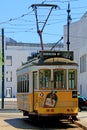 Historic yellow cable car at cais do sodre in lisbon