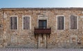 Historical abandoned building and old style balcony in Foca IzmÃÂ±r Turkey