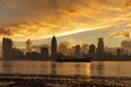 Historical architecture on the bund of Shanghai city and modern city skyscrapers of Shanghai city skyline in misty gold lighting