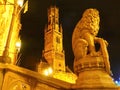 Historical belfry illuminated at night