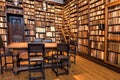 Historical bookshelves full of antique books inside printing museum of Plantin-Moretus, UNESCO World Heritage Site