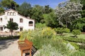 Historical botanical garden with masia, typical catalan rural h Royalty Free Stock Photo