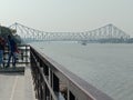 The historical bridge called Howrah bridge situated in India developed by East India company when they ruled in India