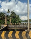 Historical bridge in the Udupi with Indian lion pillar and beautiful sky