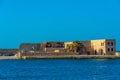 Historical building at a breakwater of Venetian port of Chania a