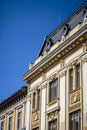 Historical building facade with classical elements. Royalty Free Stock Photo