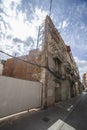 Historical building facade with supporting structure in order to preserve it while new building is erected