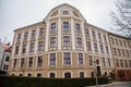 Historical building of Secondary School of Applied Arts and Higher Vocational School, cityscape of medieval town in winter day,