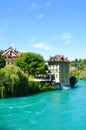 Historical buildings along turquoise Aare River in the historical old town of the Swiss capital Bern. Switzerland summer, city. Royalty Free Stock Photo