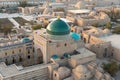 Historical buildings of Khiva Uzbekistan from above. Building with green dome is mausoleum of Pahlavan Mahmoud