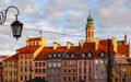 Historical buildings at Market Square of the Old Town with Christmas decorations in sunset. Warsaw, Poland Royalty Free Stock Photo