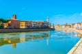 Historical buildings stretched alongside river Arno in the historical center of the italian city Pisa....IMAGE Royalty Free Stock Photo