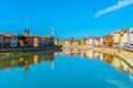 Historical buildings stretched alongside river Arno in the historical center of the italian city Pisa....IMAGE Royalty Free Stock Photo