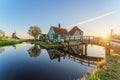 Historical buildings and windmills at dawn in Zaanse Schans, Netherlands Royalty Free Stock Photo