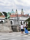 Historical center of Ljubljana with dragons and tourists Royalty Free Stock Photo