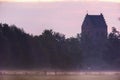 Historical church in mist