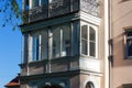 historical city facades with windows balcony doors