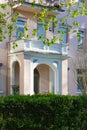 historical city facades with windows balcony doors