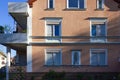 historical city facades with windows balcony doors