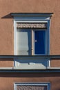 historical city facades with windows balcony doors