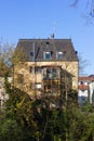 historical city facades with windows balcony doors