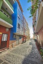 Historical city street view of residential houses in small and narrow alley or road in tropical Santa Cruz, La Palma Royalty Free Stock Photo