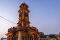 historical clock tower ancient architecture with bright blue sky at sunset from different angle