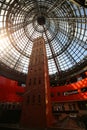 Historical Coop`s  Shot Tower, encased by the Melbourne Central 84 m-high conical glass roof. Royalty Free Stock Photo