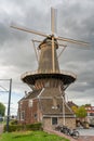 Historical dutch windmill in the city of Delft known locally as De Roos (the rose)