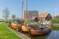 Historical fishing vessels anchored in harbor Dutch fishing village Workum Royalty Free Stock Photo