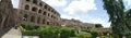 Historical Golconda fort with beautiful greenery and shiny white clouds