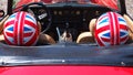 Historical Gran Prix. Helmet with English flag in a historic car