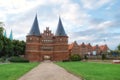 Historical Holstentor City Gate. View at cloudy day