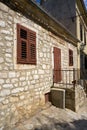 Historical house from traditional limestone in Krk in Croatia