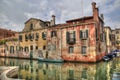 Historical houses on a canal in Venice, Italy