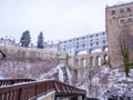 Historical houses and castle landmark statue river winter season snow in Cesky Krumlov. Czech Republic